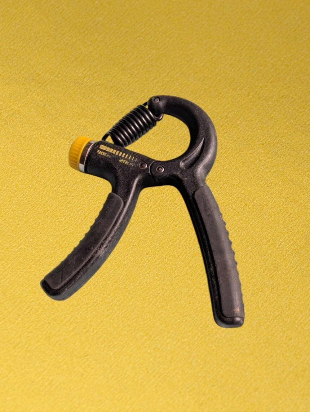 Gold's Gym Adjustable Black Hand Grip Strengthener with Yellow Dial